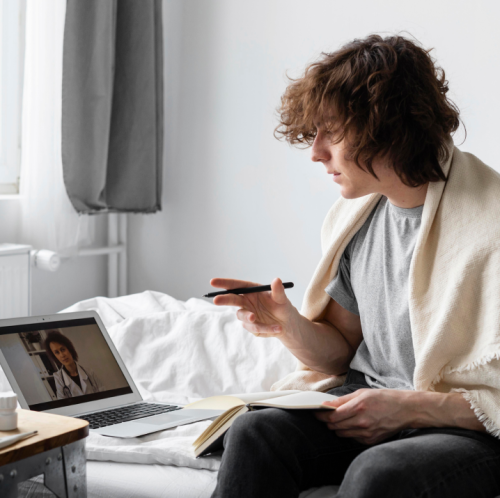 man-taking-notes-from-his-doctor