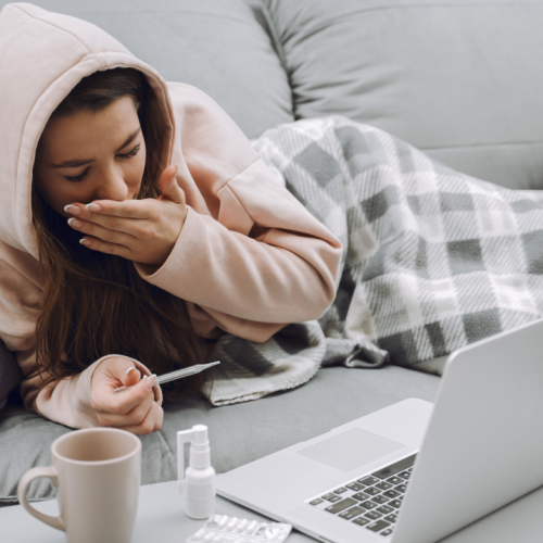 sick-woman-with-headache-sitting-home