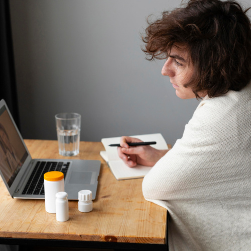 sick-young-man-talking-his-doctor-by-videocall